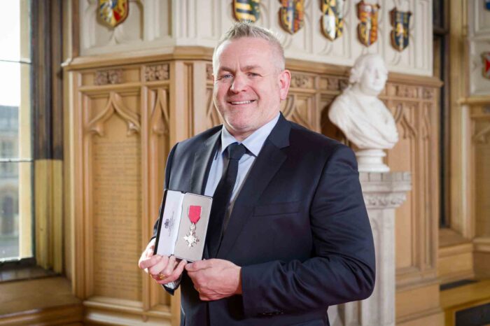 Derby entrepreneur honoured with MBE by Prince of Wales at Windsor Castle