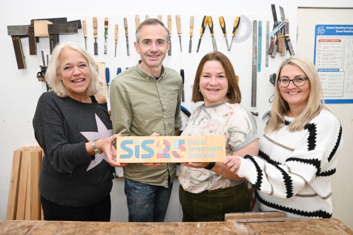 SIS builds impact momentum with £52.5 million in active social investments